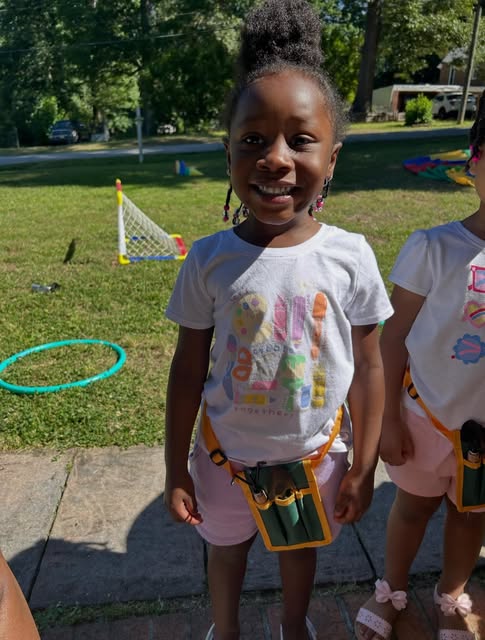 Smiling student at Jah's Learning House